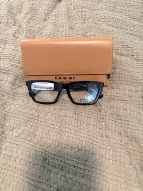 Burberry Woman’s Black Frames with Tan Case